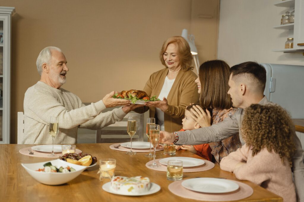 pexels-photo-5591206-5591206 A family shares a joyful Thanksgiving dinner together at home.